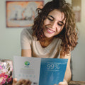 Load image into Gallery viewer, Lifestyle image(s) featuring Tree-Free’s 99% Chance Of Wine card