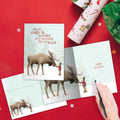 Load image into Gallery viewer, The inside of Tree-Free’s Magic And Wonder card, with the cover and envelope in the background.