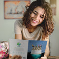 Load image into Gallery viewer, Lifestyle image(s) featuring Tree-Free’s Penguin Cake card