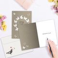 Load image into Gallery viewer, The inside of Tree-Free’s Sending Love Support Card card, with the cover and envelope in the background.