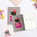 Load image into Gallery viewer, The inside of Tree-Free’s Party Kitty card, with the cover and envelope in the background.
