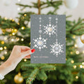 Load image into Gallery viewer, Lifestyle image(s) featuring Tree-Free's Silver And Gold Christmas Christmas Card card