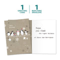 Load image into Gallery viewer, The cover and inside of Tree-Free’s Balancing Penguins Christmas Card card, along with the following text: “1 greeting card, 1 matching envelope”