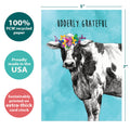 Load image into Gallery viewer, The cover of Tree-Free’s Udderly Grateful card with lines demonstrating its 5x7 dimensions, along with the following text: “100% PCW recycled paper, proudly made in the USA, sustainably printed on extra-thick card stock”
