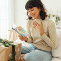 Load image into Gallery viewer, Lifestyle image(s) featuring Tree-Free’s Christmas Dreams card