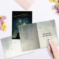 Load image into Gallery viewer, The inside of Tree-Free’s Twinkle card, with the cover and envelope in the background.