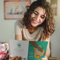 Load image into Gallery viewer, Lifestyle image(s) featuring Tree-Free’s Slow Sloth Birthday card