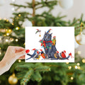 Load image into Gallery viewer, Lifestyle image(s) featuring Tree-Free's Cat Bird Christmas Christmas Card card