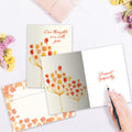 Load image into Gallery viewer, The inside of Tree-Free’s Sympathy Flowers Sympathy Card card, with the cover and envelope in the background.