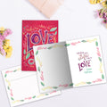 Load image into Gallery viewer, The inside of Tree-Free’s Love Is Life card, with the cover and envelope in the background.
