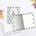 Load image into Gallery viewer, The inside of Tree-Free’s Bee Happy card, with the cover and envelope in the background.
