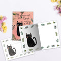 Load image into Gallery viewer, The inside of Tree-Free’s All You Need Is Cat card, with the cover and envelope in the background.