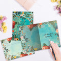 Load image into Gallery viewer, The inside of Tree-Free’s Lifted Sympathy Card card, with the cover and envelope in the background.