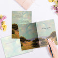 Load image into Gallery viewer, The inside of Tree-Free’s With You Still card, with the cover and envelope in the background.