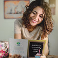 Load image into Gallery viewer, Lifestyle image(s) featuring Tree-Free’s Birthday Calories card
