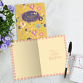 Load image into Gallery viewer, The inside of Tree-Free’s Easter Wishes card, with the cover and envelope in the background.