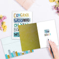 Load image into Gallery viewer, The inside of Tree-Free’s Woohoo Congrats card, with the cover and envelope in the background.