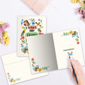 Load image into Gallery viewer, The inside of Tree-Free’s Winner Dreamer card, with the cover and envelope in the background.
