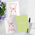 Load image into Gallery viewer, The inside of Tree-Free’s Pink Bunny card, with the cover and envelope in the background.