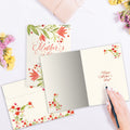 Load image into Gallery viewer, The inside of Tree-Free’s A Mother's Hug card, with the cover and envelope in the background.