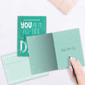 Load image into Gallery viewer, The inside of Tree-Free’s My Favorite Dad card, with the cover and envelope in the background.