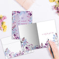 Load image into Gallery viewer, The inside of Tree-Free’s Floral Paws card, with the cover and envelope in the background.