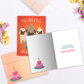 Load image into Gallery viewer, The inside of Tree-Free’s Pugs And Kisses Birthday Card card, with the cover and envelope in the background.