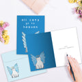 Load image into Gallery viewer, The inside of Tree-Free’s Cat Heaven Pet card, with the cover and envelope in the background.