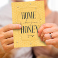 Load image into Gallery viewer, Lifestyle image(s) featuring Tree-Free’s Honey Home card
