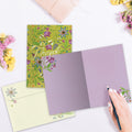 Load image into Gallery viewer, The inside of Tree-Free’s Pretty Thank You Card card, with the cover and envelope in the background.