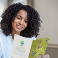 Load image into Gallery viewer, Lifestyle image(s) featuring Tree-Free's Pretty Thank You Card card