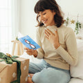 Load image into Gallery viewer, Lifestyle image(s) featuring Tree-Free’s Boho Christmas Penguins card
