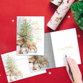 Load image into Gallery viewer, The inside of Tree-Free’s Furry Family card, with the cover and envelope in the background.
