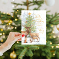 Load image into Gallery viewer, Lifestyle image(s) featuring Tree-Free's Furry Family Christmas Card card