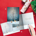 Load image into Gallery viewer, The inside of Tree-Free’s Bird Tree Holiday Card card, with the cover and envelope in the background.