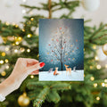 Load image into Gallery viewer, Lifestyle image(s) featuring Tree-Free's Bird Tree Holiday Card card