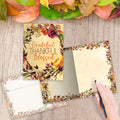 Load image into Gallery viewer, The inside of Tree-Free’s Grateful Blessed Thanksgiving Card card, with the cover and envelope in the background.