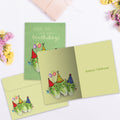 Load image into Gallery viewer, The inside of Tree-Free’s Romaine Calm card, with the cover and envelope in the background.