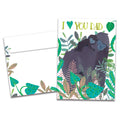Load image into Gallery viewer, The cover of Tree-Free's Shoulder to Lean On card, along with its matching envelope.