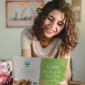 Load image into Gallery viewer, Lifestyle image(s) featuring Tree-Free’s Mark Twain Health card