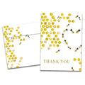 Load image into Gallery viewer, Cover of Bee Kind Thank You card (featuring serif text below artwork of bumblebees in a hive flying in a heart-shaped formation) and its matching envelope
