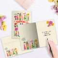 Load image into Gallery viewer, The inside of Tree-Free’s Happiness Collage Thinking Of You Card card, with the cover and envelope in the background.