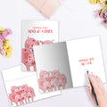 Load image into Gallery viewer, The inside of Tree-Free’s Hogs And Kisses Thinking Of You Card card, with the cover and envelope in the background.