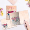 Load image into Gallery viewer, The inside of Tree-Free’s Floral Bouquet Elephant Encouragement Card card, with the cover and envelope in the background.