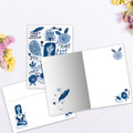 Load image into Gallery viewer, The inside of Tree-Free’s Find Peace card, with the cover and envelope in the background.
