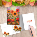 Load image into Gallery viewer, The inside of Tree-Free’s Pumpkins And Sunflowers Thanksgiving Card card, with the cover and envelope in the background.
