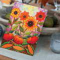 Load image into Gallery viewer, Lifestyle image(s) featuring Tree-Free’s Pumpkins And Sunflowers Thanksgiving Card card