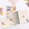 Load image into Gallery viewer, The inside of Tree-Free’s One Day At A Time Get Well Card card, with the cover and envelope in the background.
