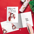 Load image into Gallery viewer, The inside of Tree-Free’s Peace in the World card, with the cover and envelope in the background.
