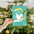 Load image into Gallery viewer, Lifestyle image(s) featuring Tree-Free's Peace Dove Holiday Card card
